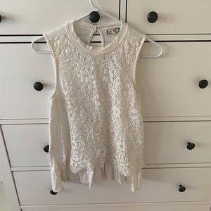 Eyeshadow embroidered white flowy tank